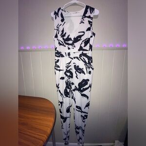 Black and white floral print jumpsuit with slit on the side